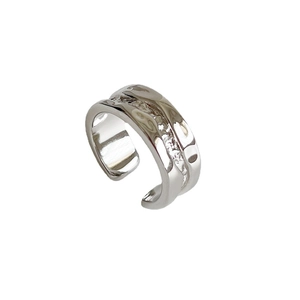 Irregular textured silver open ring with unique lava flow wave design in minimalist style