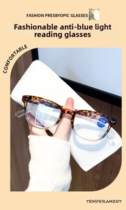 Close-up of stylish tortoiseshell reading glasses with +2.00 strength and blue light coating