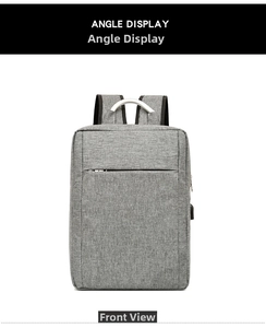 Front view of grey travel backpack with built-in USB charging port and metal zippers