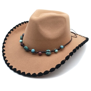 Close-up of Western felt hat with turquoise beads and black woven stitched brim detail