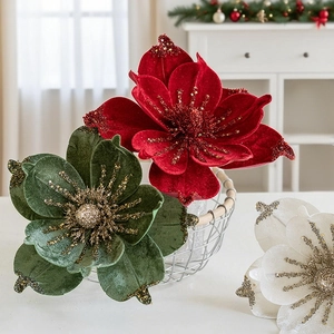 Close-up of sparkling sequined velvet magnolia flowers for Christmas tree decoration