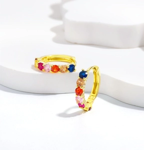 Detailed close-up of 925 sterling silver gold hoop earrings with colorful zircon stones