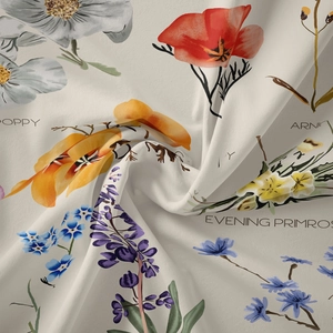 Detailed close-up of premium fabric with watercolor poppy and arnica floral patterns