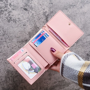 Pink trifold PU leather mini wallet with multiple card slots and ID window display