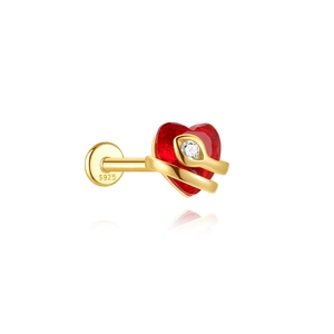 Detailed macro view of S925 sterling silver heart earring with gold snake and red gem