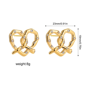 Detailed view of 18K gold plated croissant earrings with diamond inlay and size specs