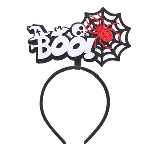 Halloween headband detail with black bat, skull, and glittery spider on a web