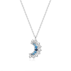 Elegant crescent moon pendant necklace with blue crystals and stars on a silver chain