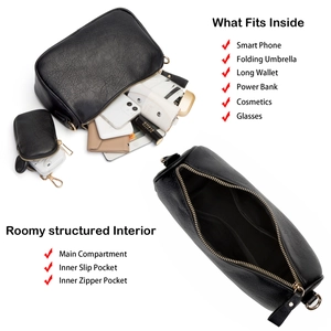 Macro view of black litchi leather saddle bag interior compartments and storage capacity