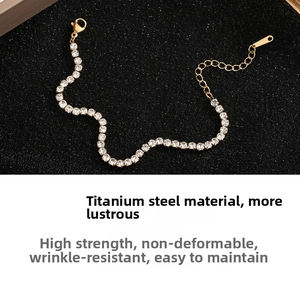 Detail of silver titanium steel tennis bracelet with micro-pave cubic zirconia crystals