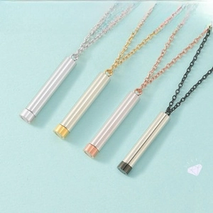 Polished bar pendant necklaces in silver, gold, rose gold, and black stainless steel