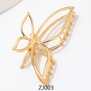 Elegant large golden alloy butterfly hair claw clip with cutout design measuring 10.5x5cm