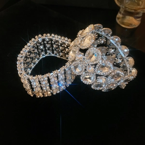 Close-up of luxury stretch bracelet with mixed-cut rhinestones and silver finish