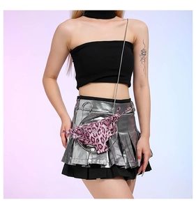 Detail of pink leopard print mini bag with a large silver metal ring and chain strap