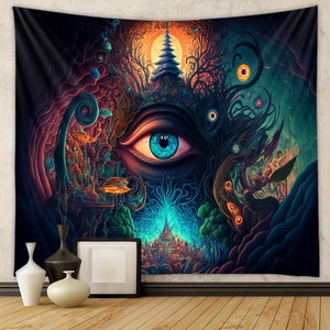 Artistic detail of surreal psychedelic mushroom tapestry with a giant eye on room wall
