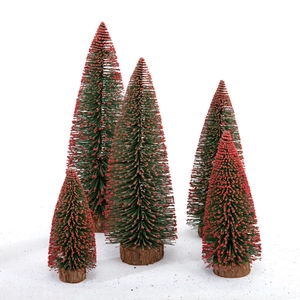 Miniature flocked Christmas trees with red tips on wooden bases for festive decor