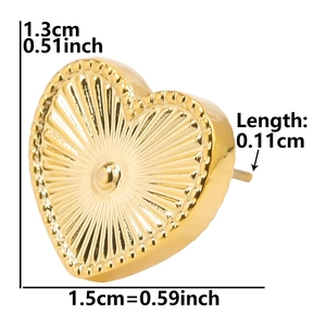 Macro detail of golden heart stud earring with sunburst texture and precise dimensions