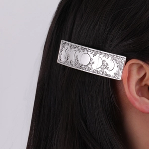 Vintage silver crescent moon phase forest hair clip for women featuring engraved tree leaves