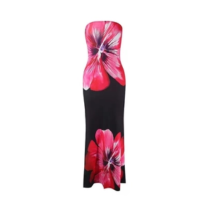 Detailed view of pink floral print on a sleek black strapless maxi dress fabric