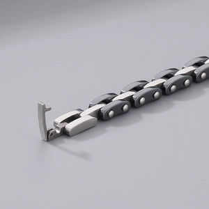 Macro shot of silver stainless steel link bracelet with precise buckle clasp mechanism