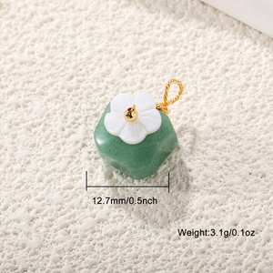 Macro detail of a green stone pendant with shell flower and dimensions showing 12.7mm size
