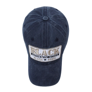 Vintage washed navy blue baseball cap with embroidered letter patch for sun protection