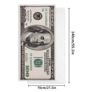 Detail shot of the 140x70cm microfiber beach towel with 100 dollar bill pattern