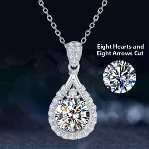 Detail of pear-shaped pendant featuring a brilliant hearts and arrows cut stone