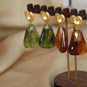 Vintage palace style resin drop earrings with gold heart studs in green and amber colors