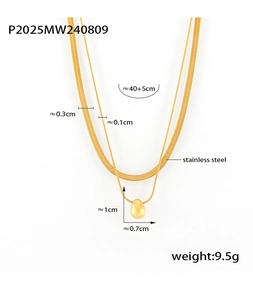 Detail of gold double-layered stainless steel necklace with flat snake chain and teardrop charm