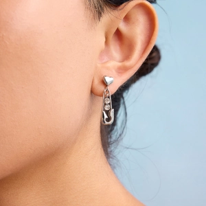 Silver stainless steel safety pin earrings with heart detail and white zircon stud