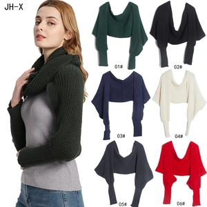 Knitted shawl scarf with sleeves detail showing dark green and multi-color options