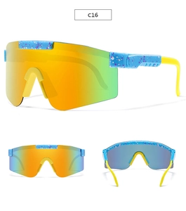 Detail view of sport cycling sunglasses with gradient lens and blue splatter frame
