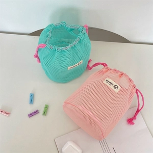 Portable mesh drawstring storage bag in mint green and pastel pink for cosmetics