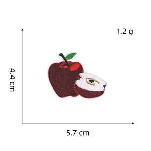 Detailed view of red apple embroidered patch with measurements 5.7cm by 4.4cm