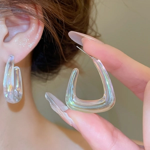 Detailed view of colorful holographic acrylic C-shaped earrings with 925 silver pins
