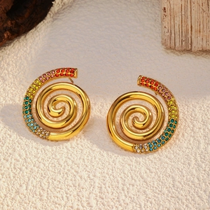Macro shot of 18k gold plated spiral earrings with rainbow cubic zirconia pavé stones