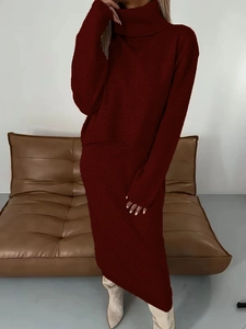 Two-piece knit set featuring high collar sweater and slim maxi skirt in deep burgundy