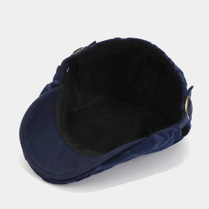 Dark blue 100% cotton flat cap with internal lining details and adjustable buckle side