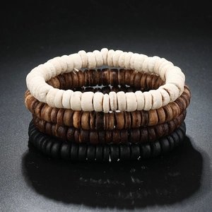 Detailed stack of four multi-layer wooden beaded bracelets in white, brown and black