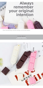 Close-up of chocolate-shaped ballpoint pens in brown, pink, and white creamy colors