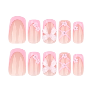 Pink French press-on nails set with 3D resin bows and embossed white flower accents
