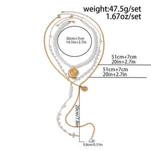 Detailed view of layered necklace set featuring pearls, shell pendant and cross with dimensions