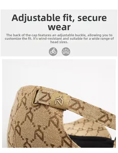 Close-up of adjustable bronze metal buckle and jacquard fabric texture on baseball cap