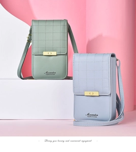 Detail of quilted leather crossbody phone bags with gold buckles in sage green and blue