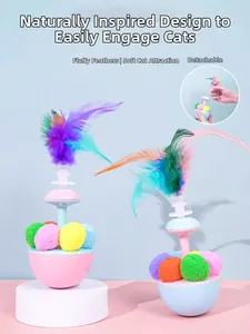 Detail view of cat tumbler toys with colorful feathers and detachable design components