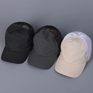 Breathable mesh back design of quick-dry baseball caps in black, grey, and beige