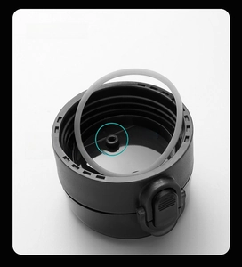 Detail of food-grade silicone seal and air vent on the frosted plastic bottle cap