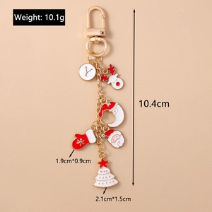 Detail showing dimensions and weight of Christmas keychain with festive charms