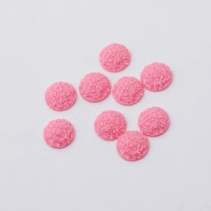 Detail of 12mm pink resin druzy cabochons with sparkling texture for DIY jewelry making